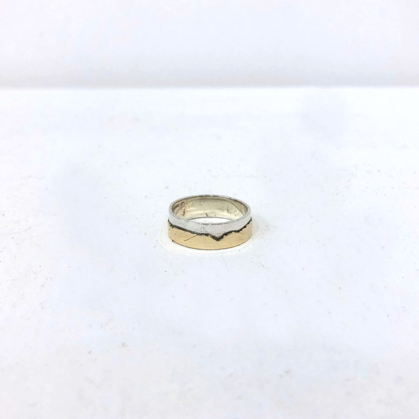 'Cairngorms Ring | Sterling Silver & 9ct Gold' by artist Jen Cunningham